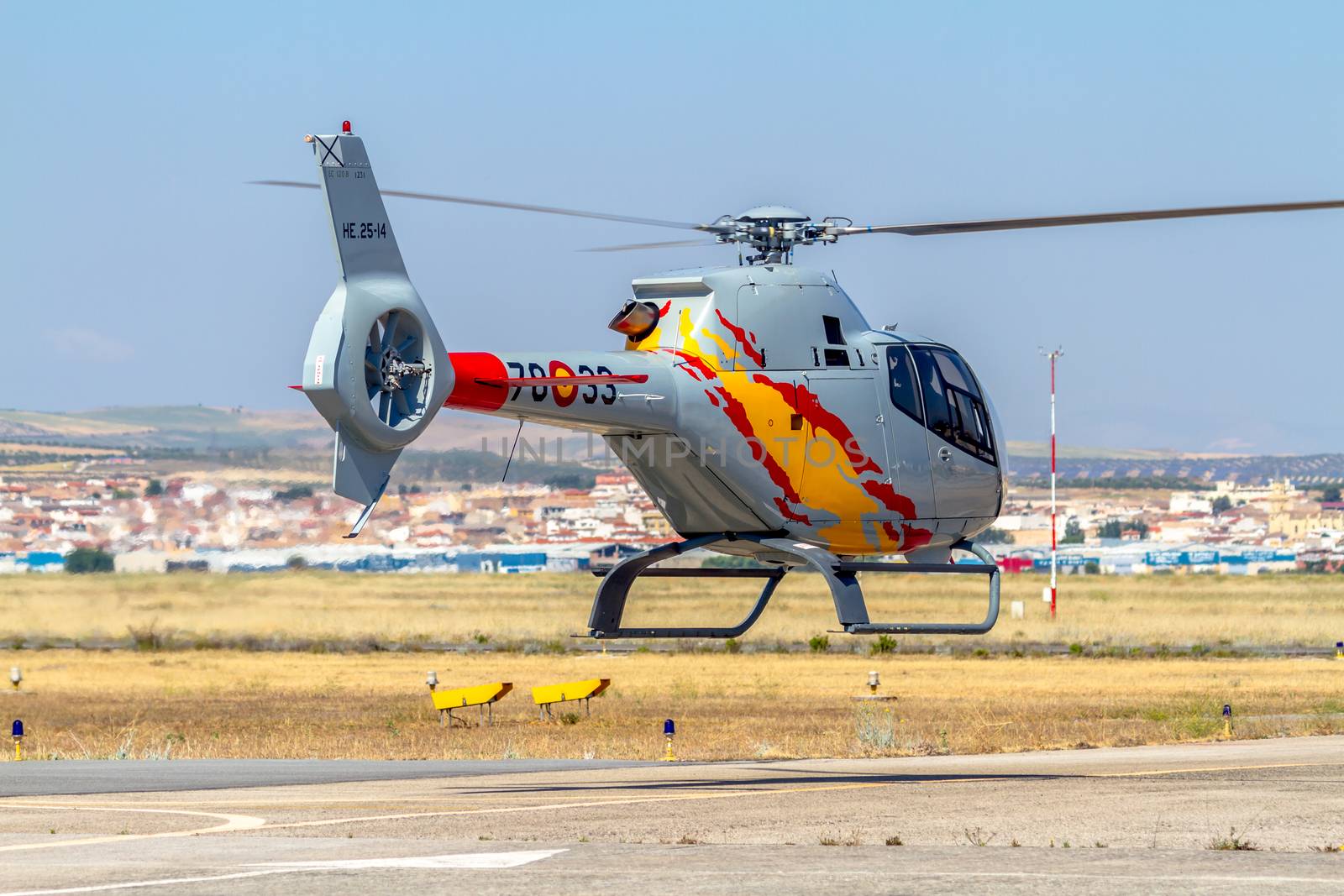 GRANADA, SPAIN-MAY 18: Helicopters of the Patrulla Aspa taking part in a exhibition on the X Aniversary of the Patrulla Aspa of the airbase of Armilla on May 18, 2014, in Granada, Spain