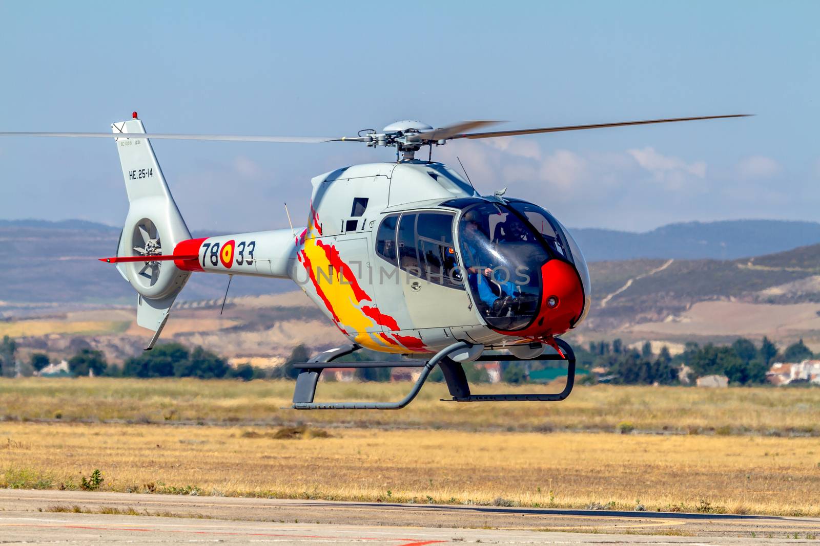 GRANADA, SPAIN-MAY 18: Helicopters of the Patrulla Aspa taking part in a exhibition on the X Aniversary of the Patrulla Aspa of the airbase of Armilla on May 18, 2014, in Granada, Spain