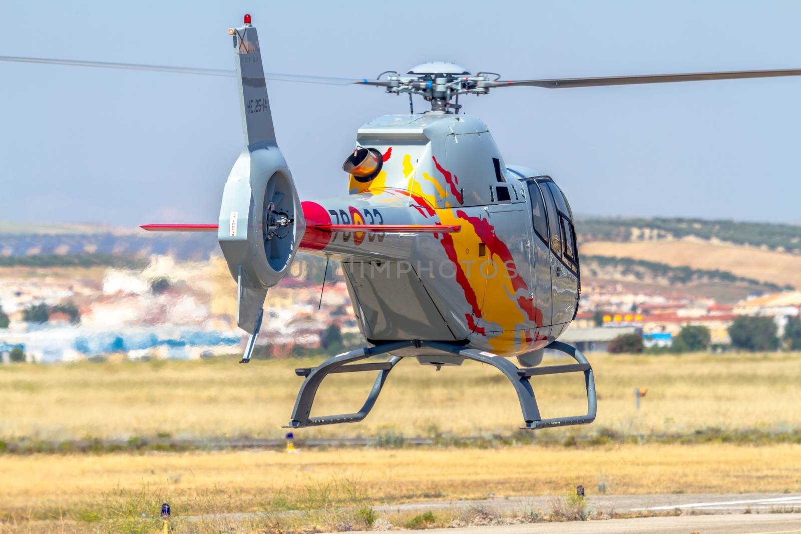 GRANADA, SPAIN-MAY 18: Helicopters of the Patrulla Aspa taking part in a exhibition on the X Aniversary of the Patrulla Aspa of the airbase of Armilla on May 18, 2014, in Granada, Spain