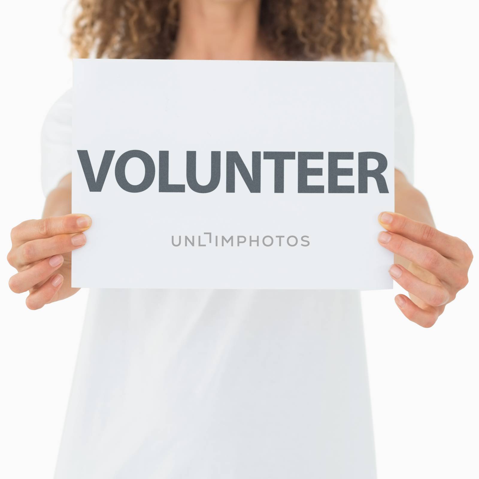 Volunteer showing a poster on white background