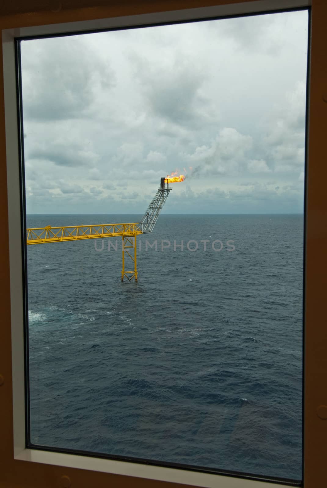 Oil and gas rig platforms through he window frame