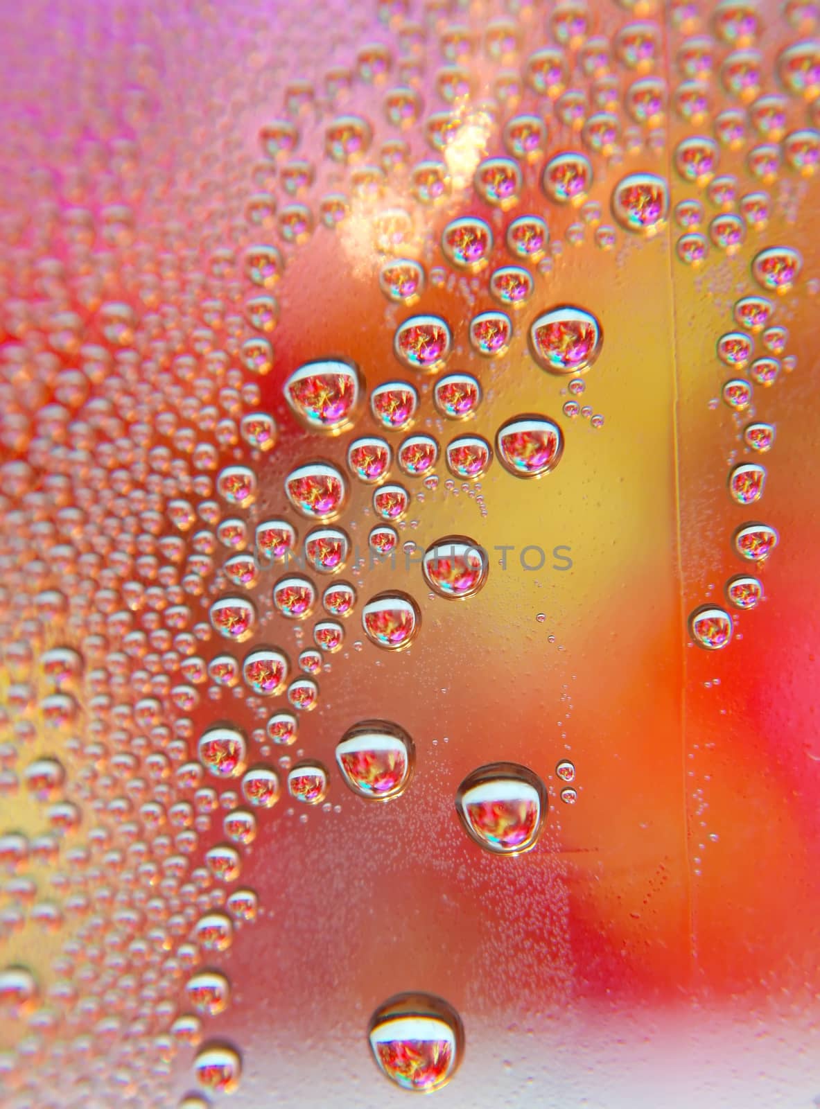 Drops of water on the crooked glass, shallow dof