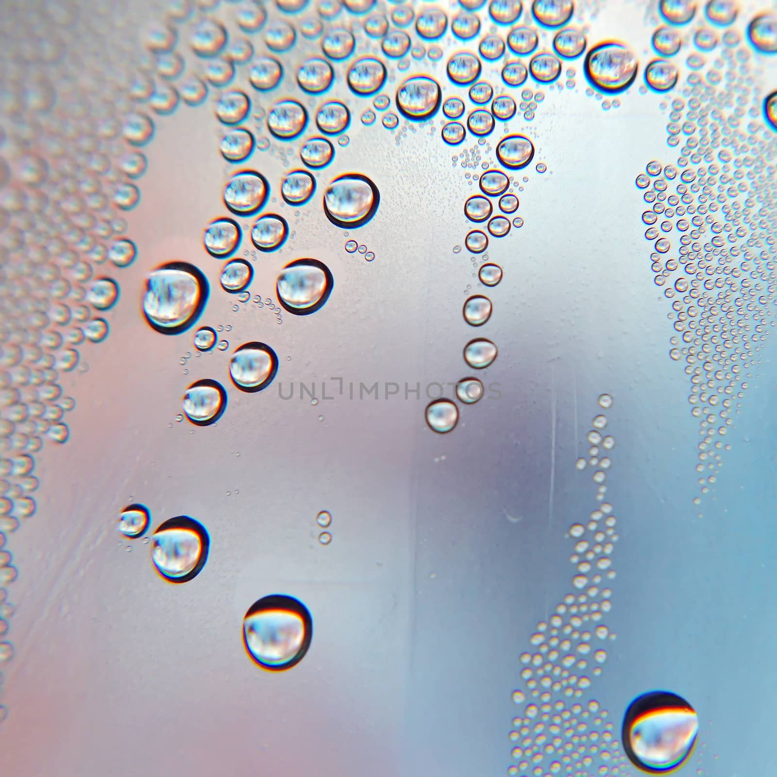 Drops of water on the crooked glass, shallow dof