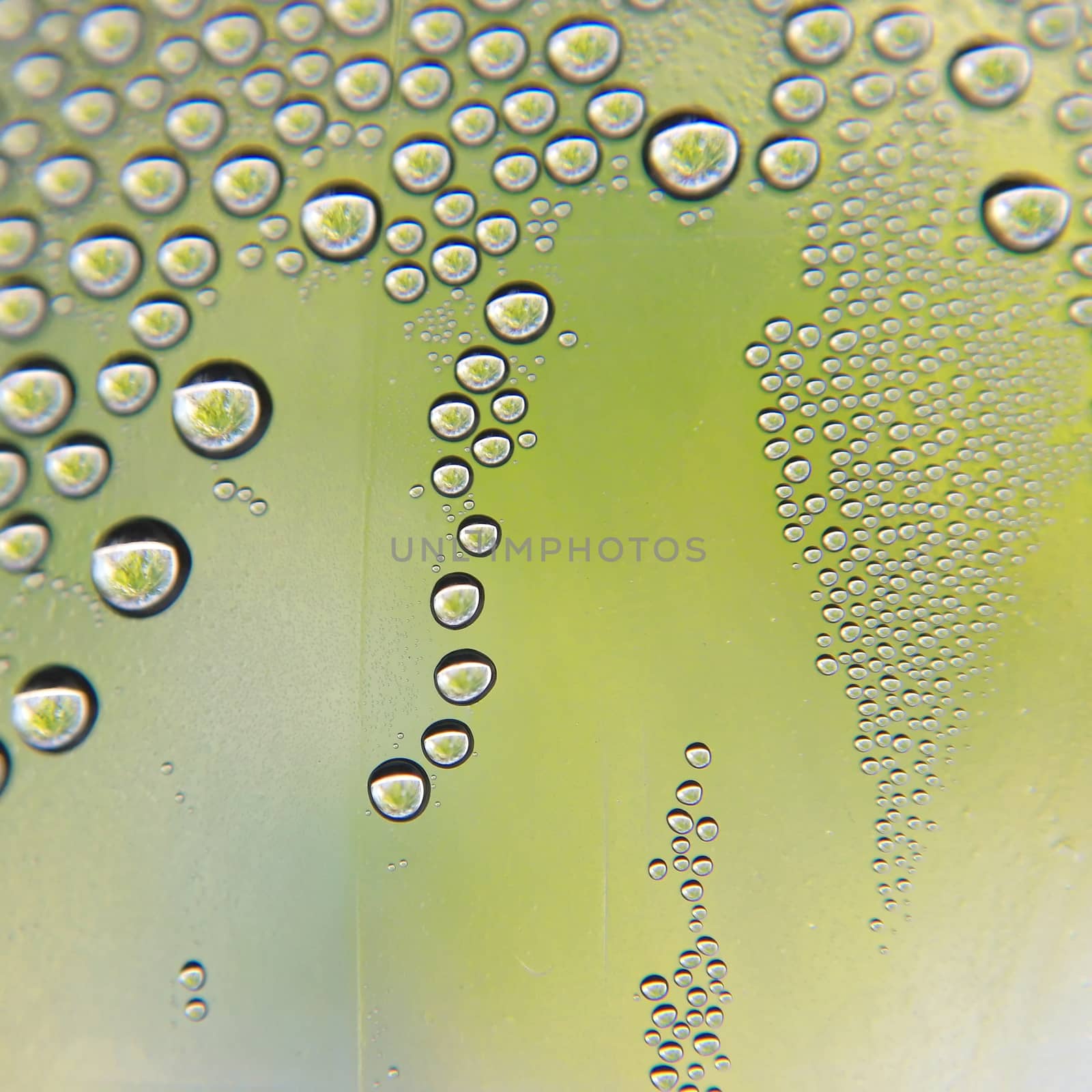 Drops of water on the crooked glass, shallow dof