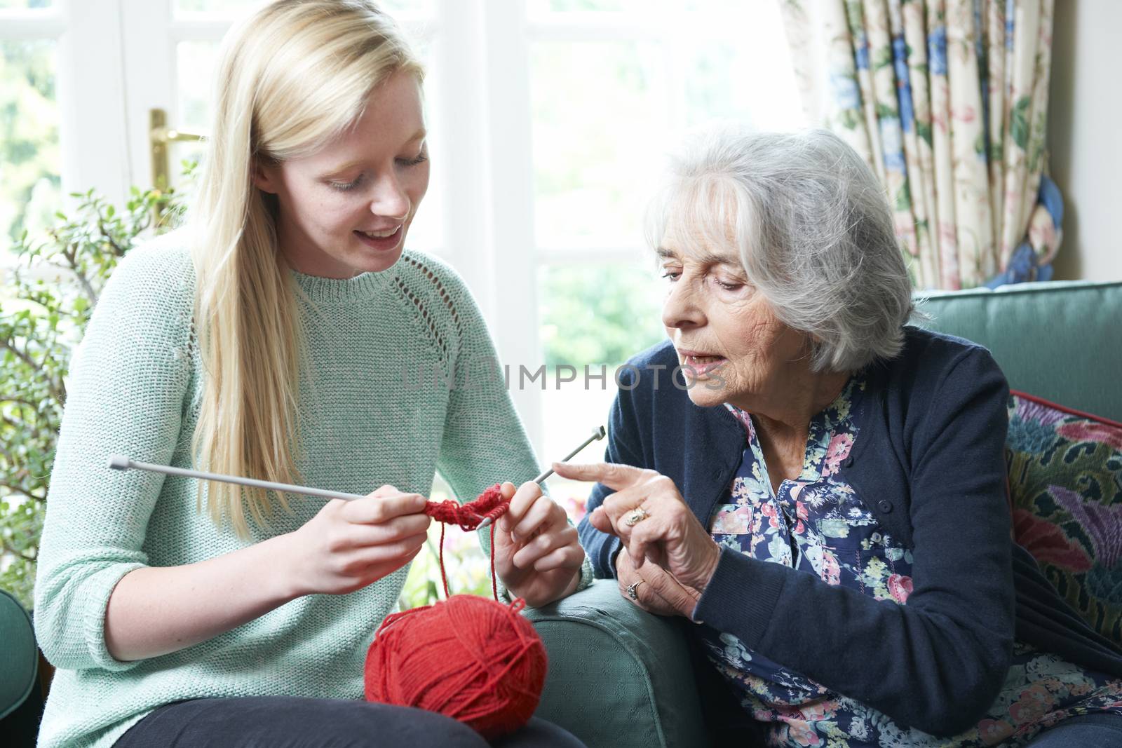 Grandmother Showing Granddaughter How To Knit by HighwayStarz