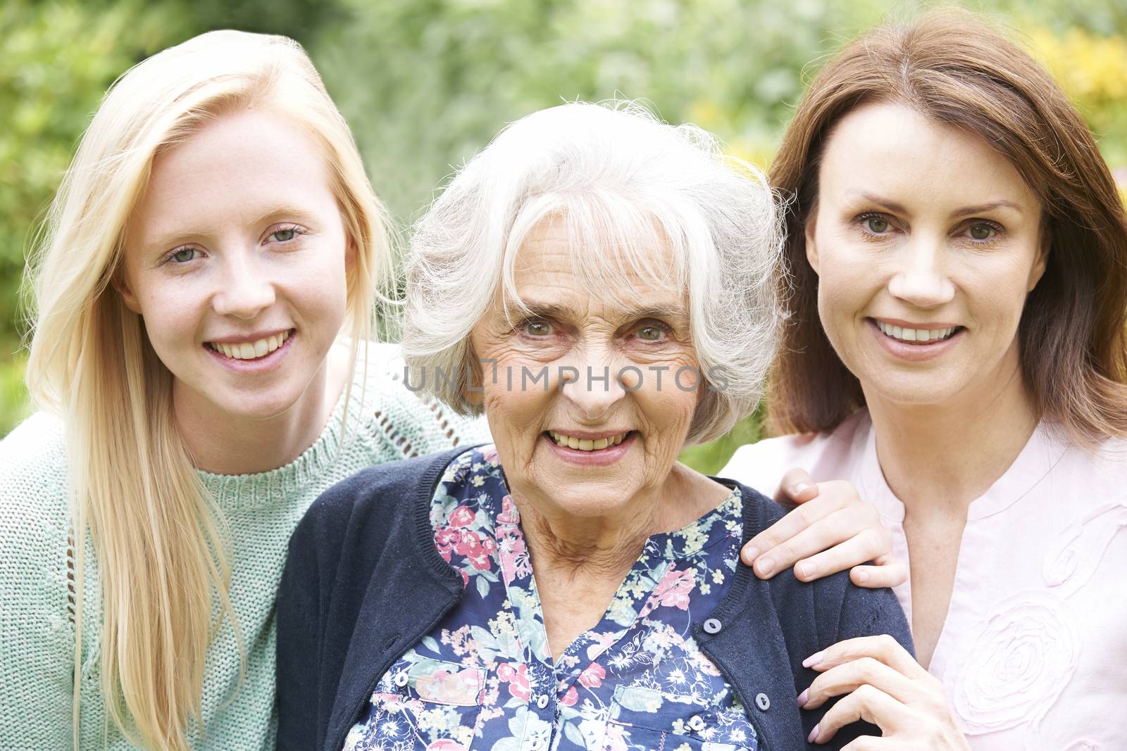 Female Multi Generation Portrait In Garden by HighwayStarz