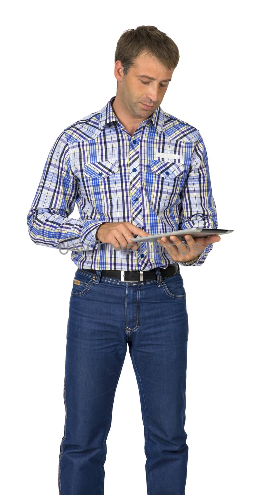 Portrait of man using his tablet pc against white background