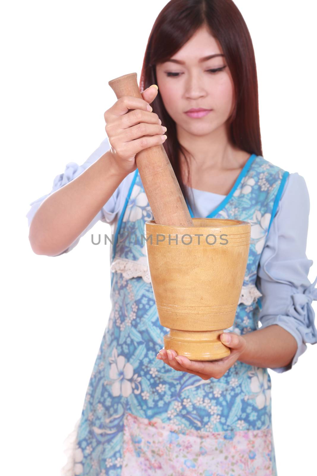 mortar and pestle with female chef isolated on white background