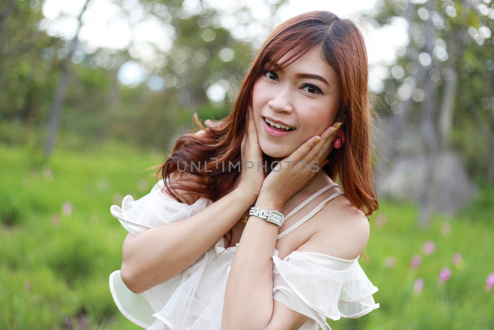 pretty asian woman in siam tulip flower field