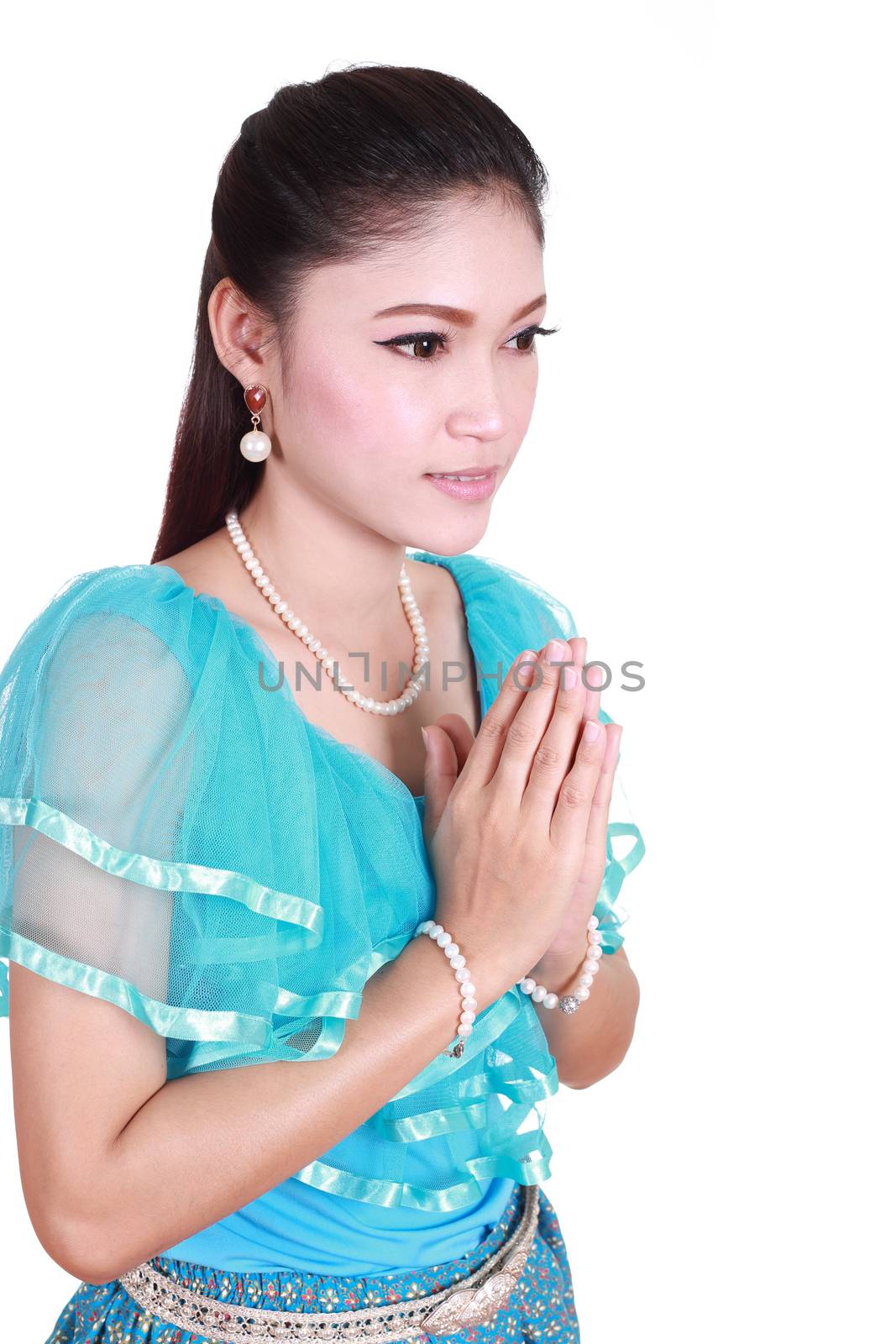 woman wearing typical thai dress pay respect by geargodz
