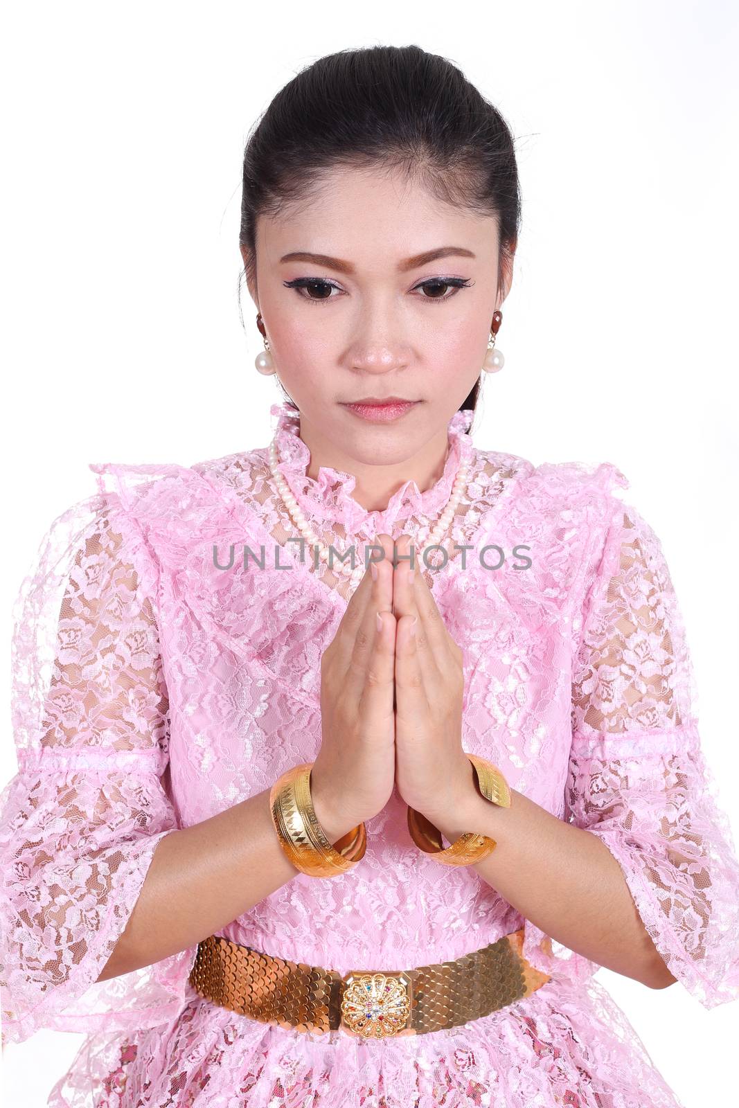 woman wearing typical thai dress pay respect isolated on white background, identity culture of thailand