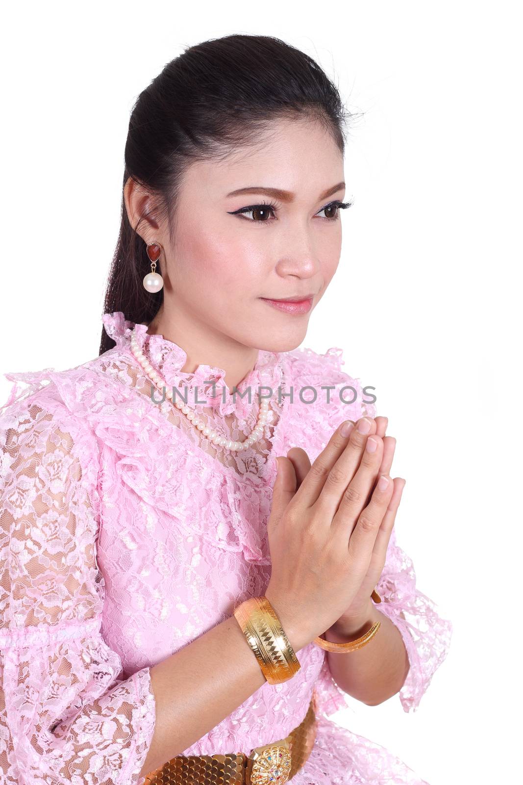 woman wearing typical thai dress pay respect by geargodz