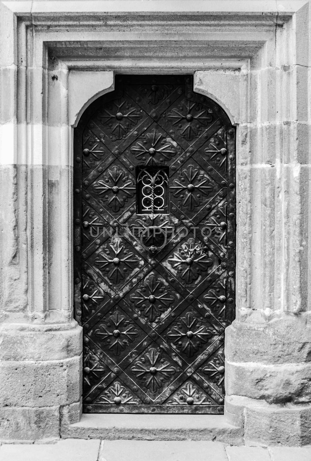 Old castle door in black and white