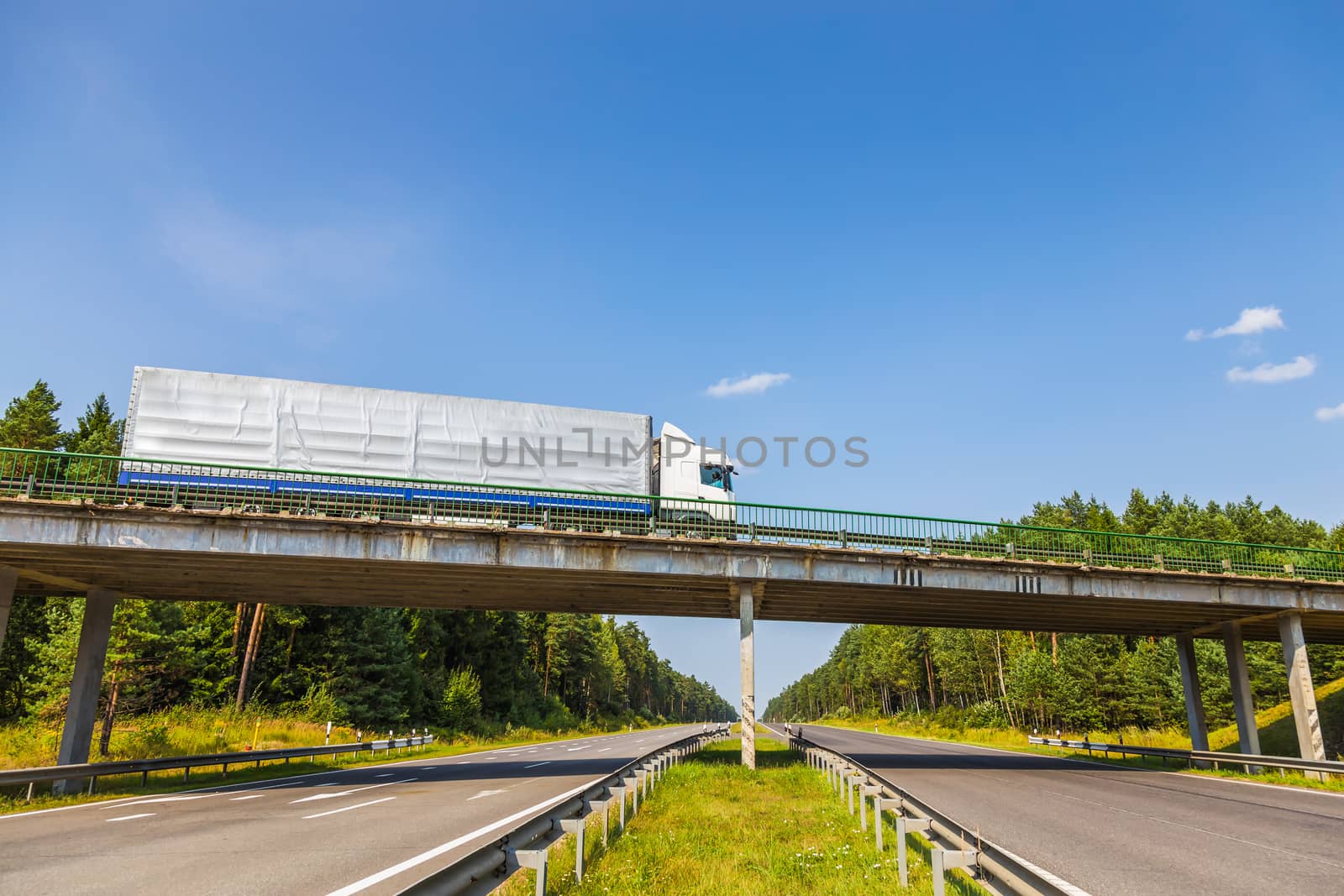 Truck on the bridge over highway