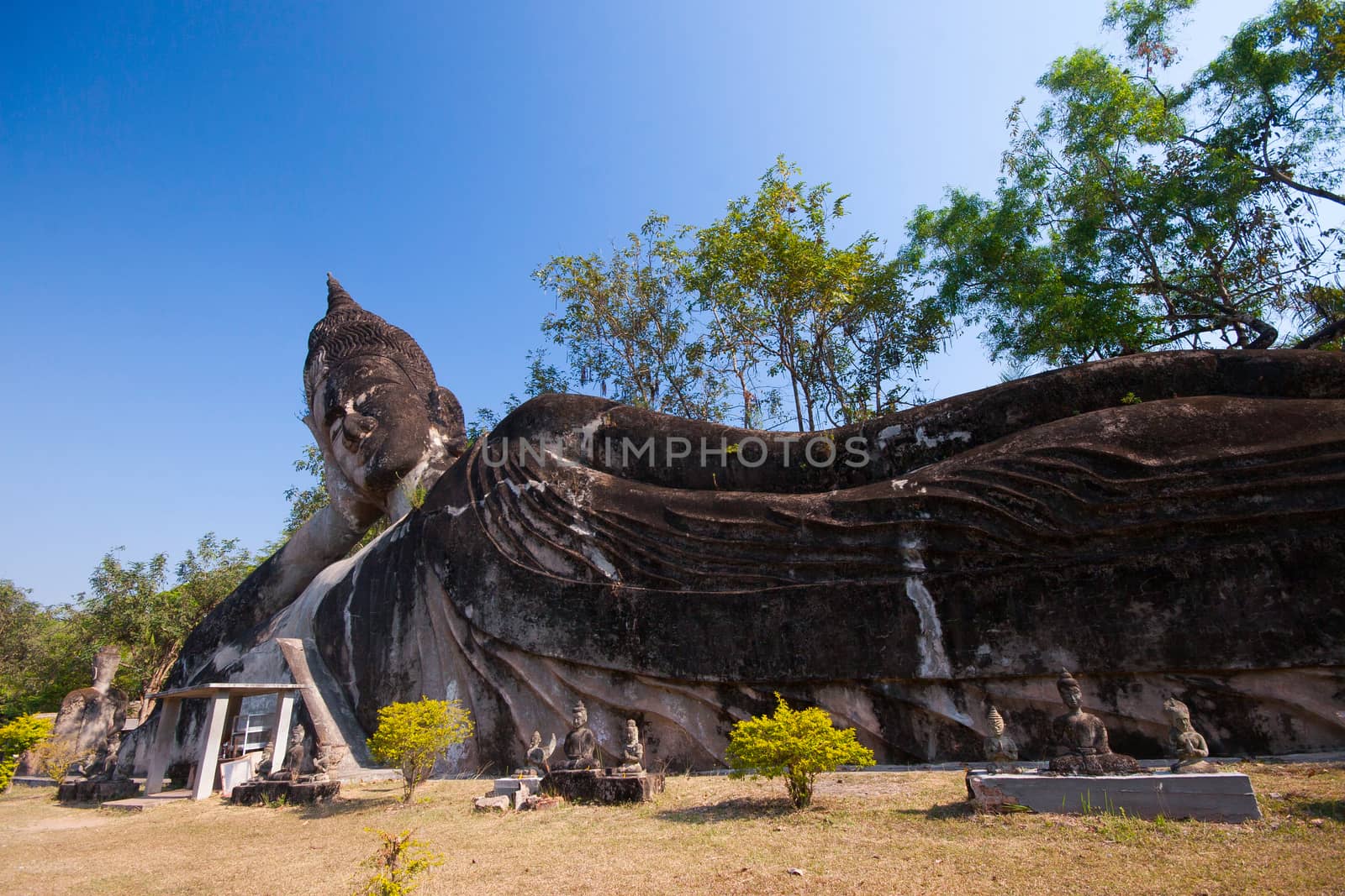 Buddha park in Vientiane, Laos. Famous travel tourist landmark of Buddhist stone statues and religious figures