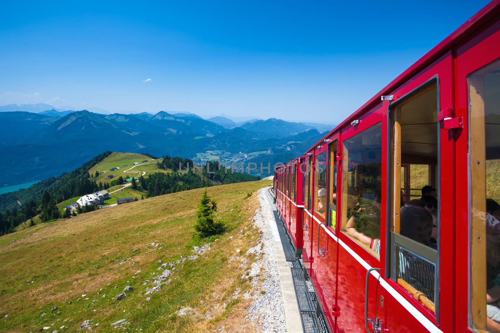 ST. WOLFGANG, AUSTRIA - AUGUST 6: Steam locomotive of a vintage cogwheel railway going to Schafberg Peak (1783m) on August 6, 2013 in St. Wolfgang.