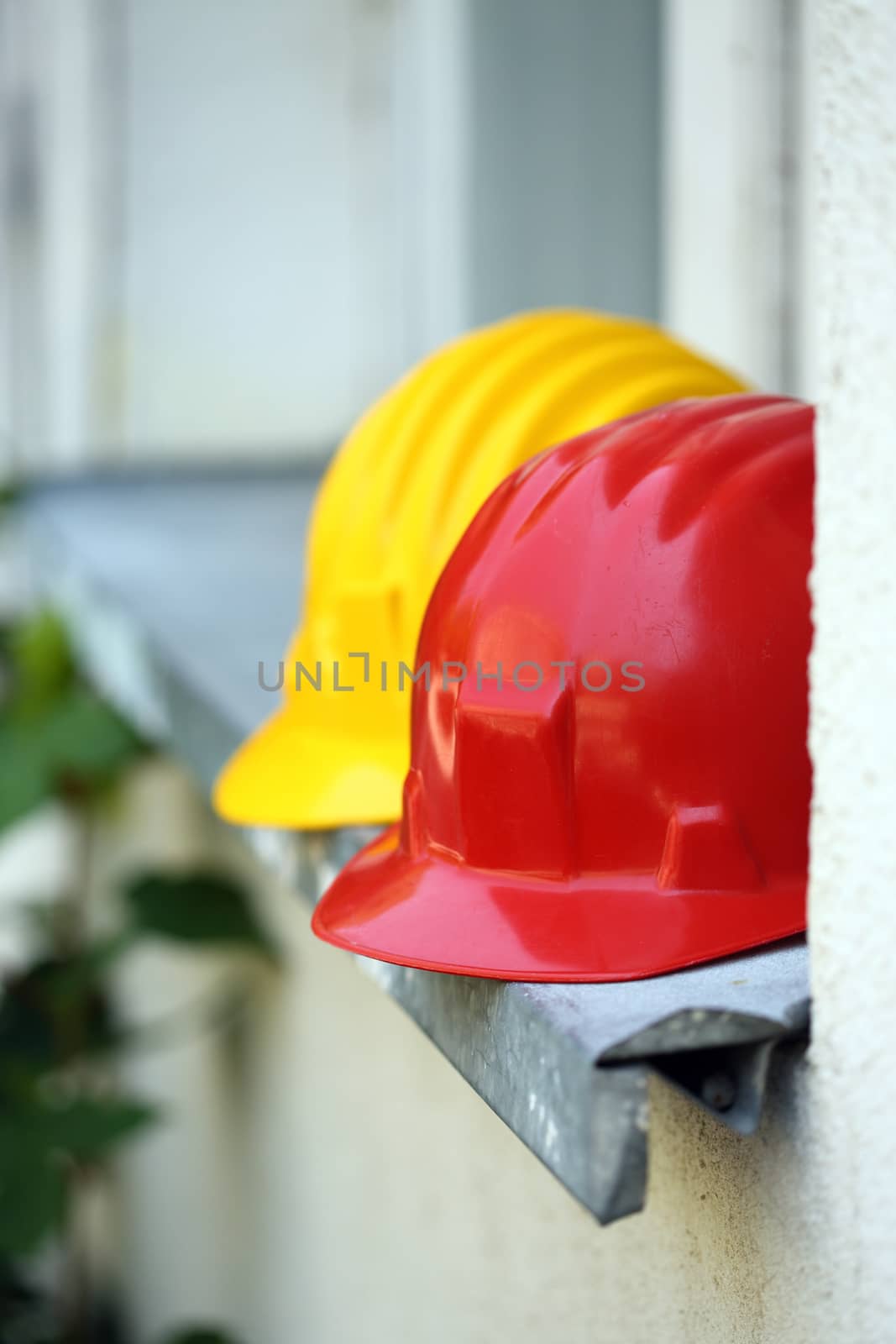 Some helmets close up on work place 