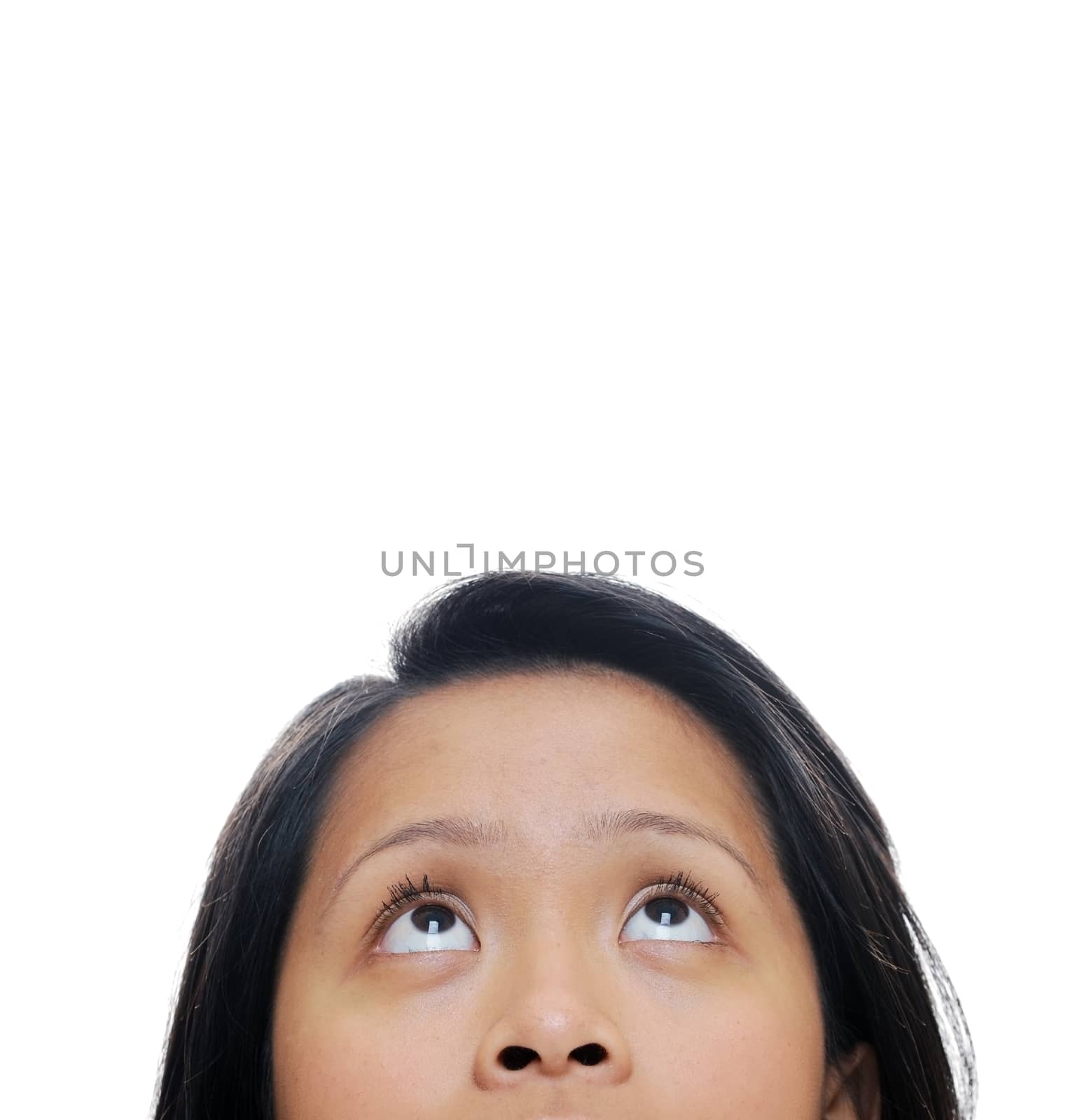 Asian girl looking up into space