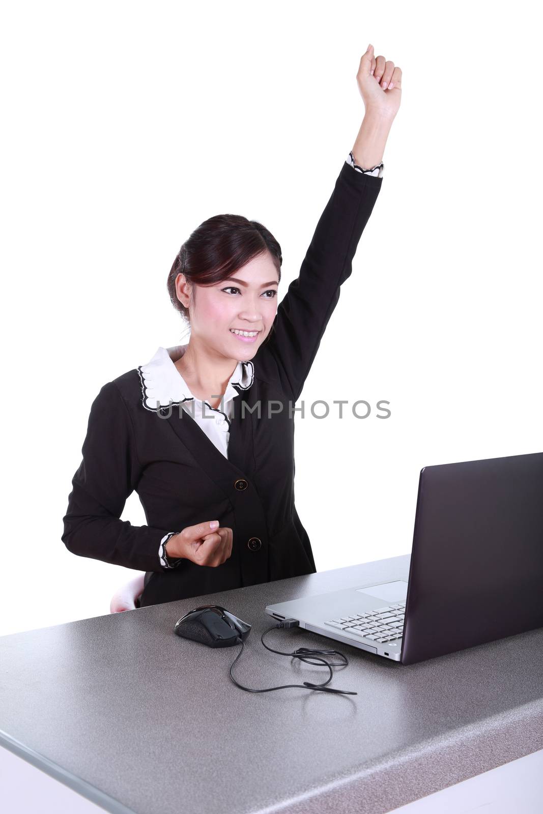 Celebrating businesswoman with laptop computer isolated on white background