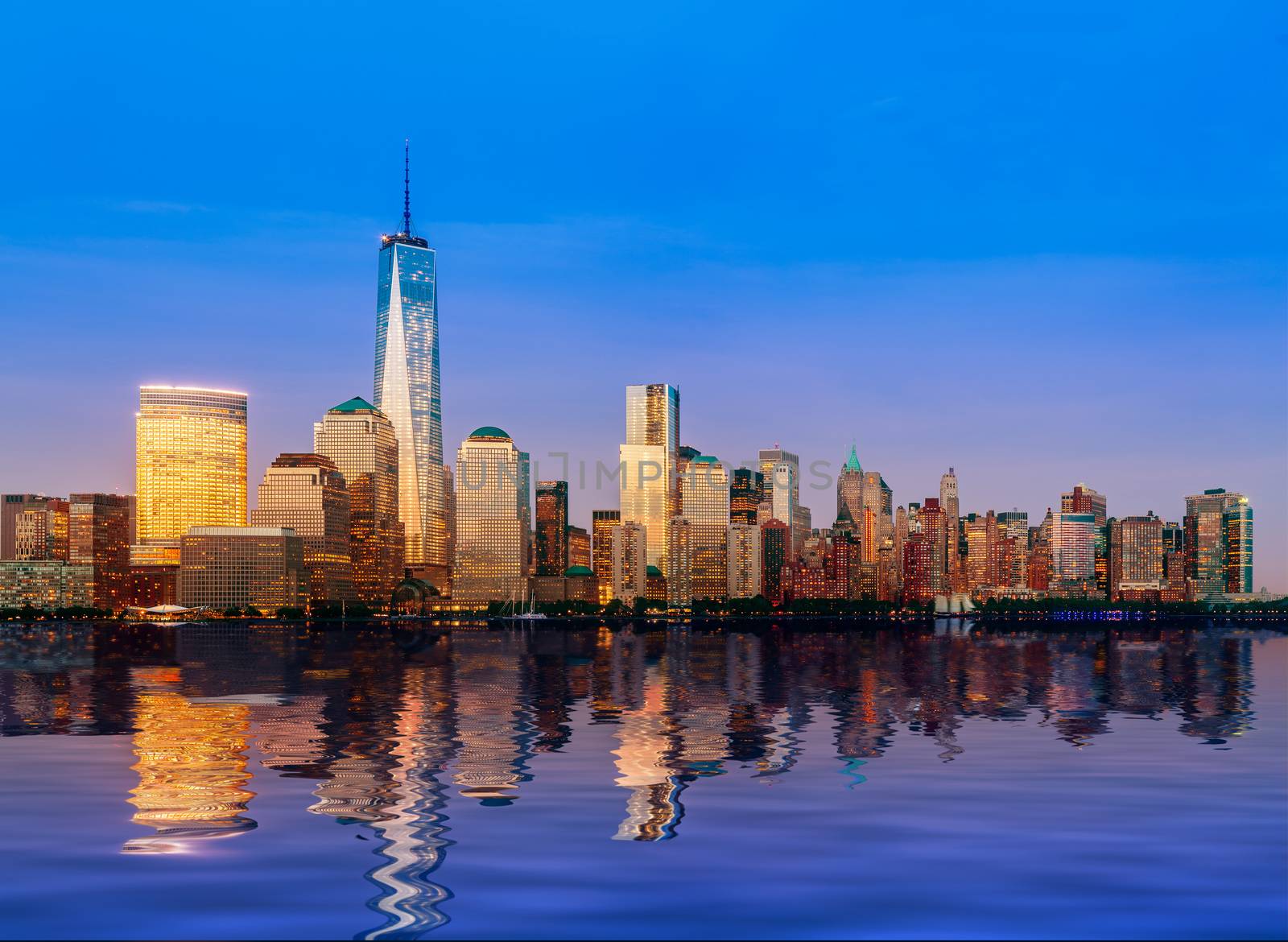 Skyline of lower Manhattan of New York City from Exchange Place at night with World Trade Center at full height of 1776 feet