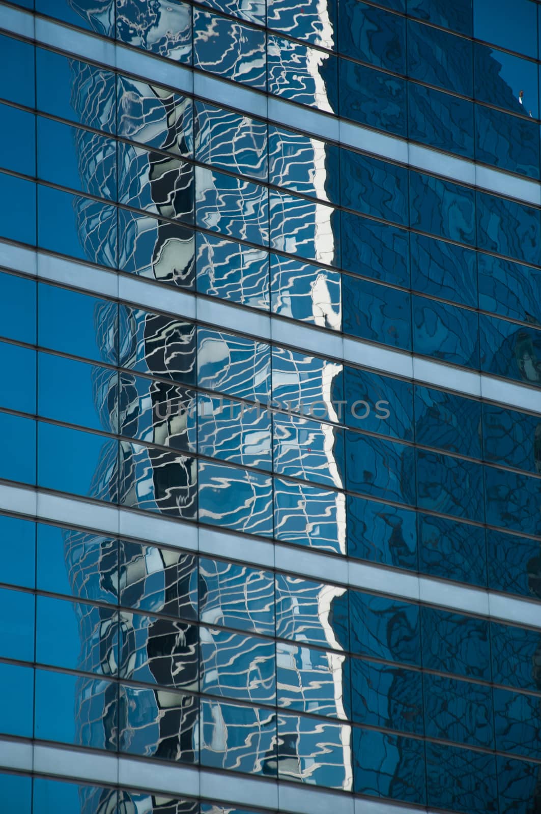 abstract architecture - windows and clouds reflexion