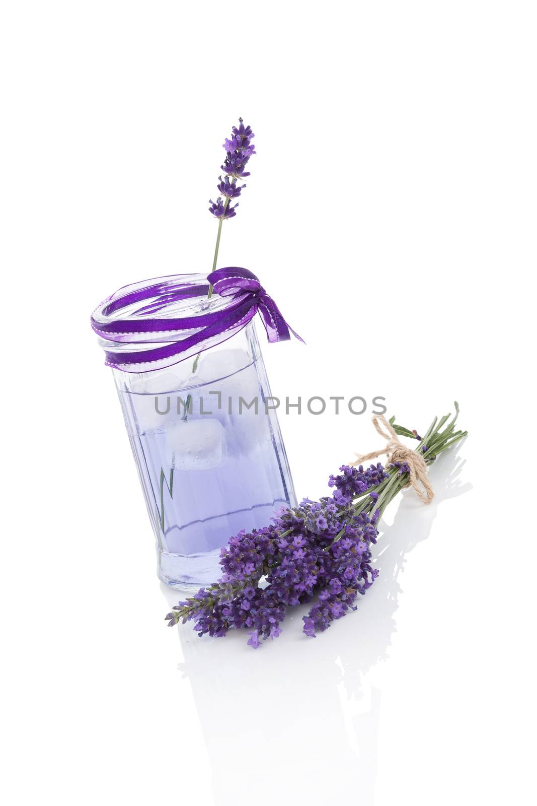 Lavender lemonade isolated on white background. Fresh natural organic herbal soft drink. 