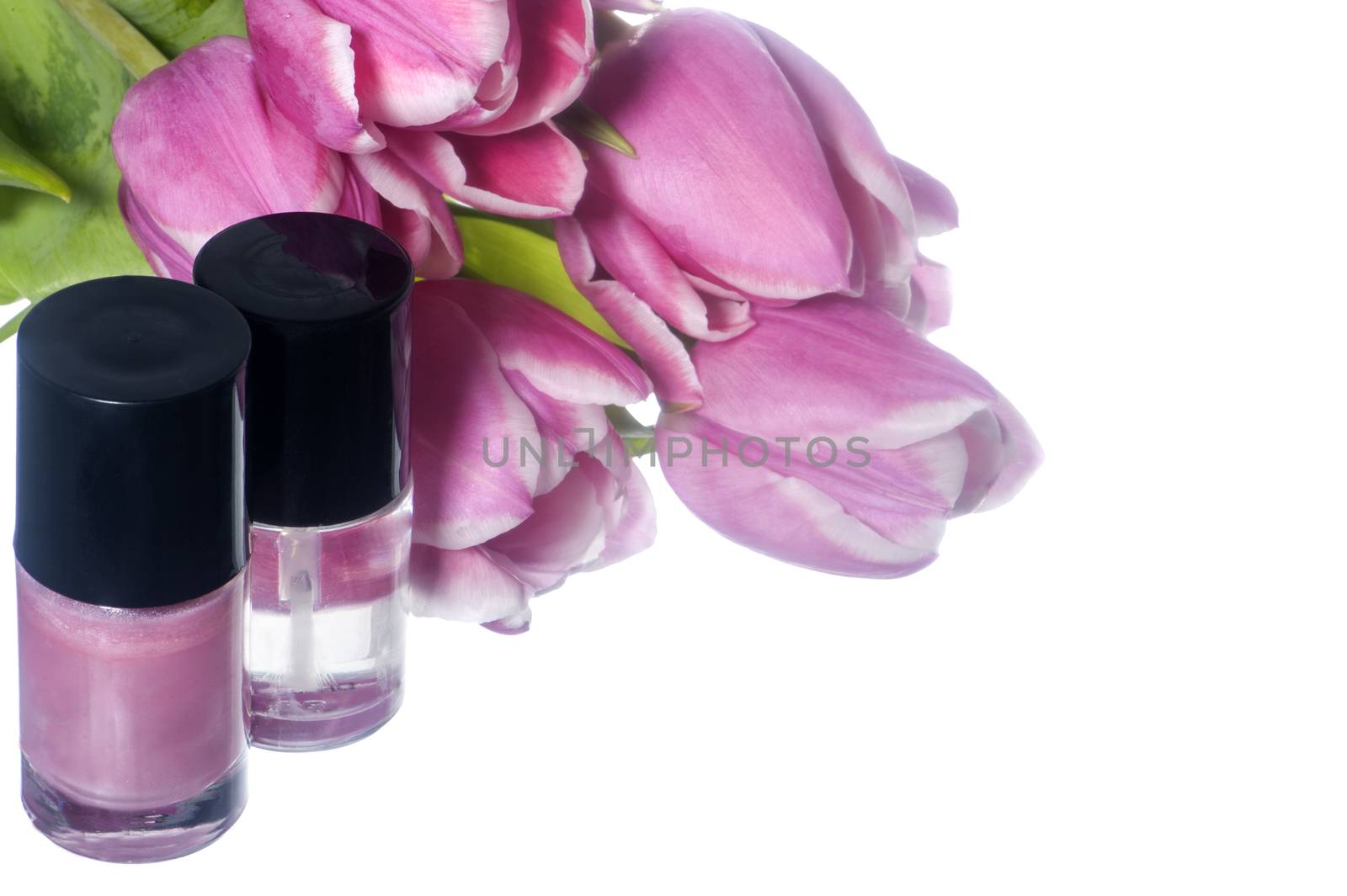 nail polish and tools  for manicure on  elegant fabric