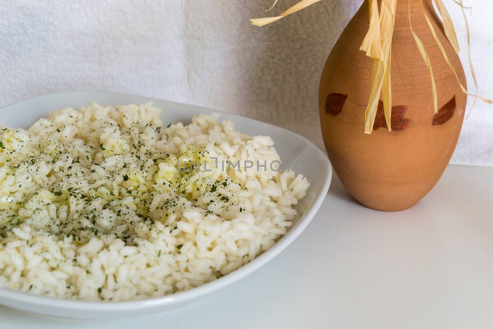 white risotto with some parsley and oil