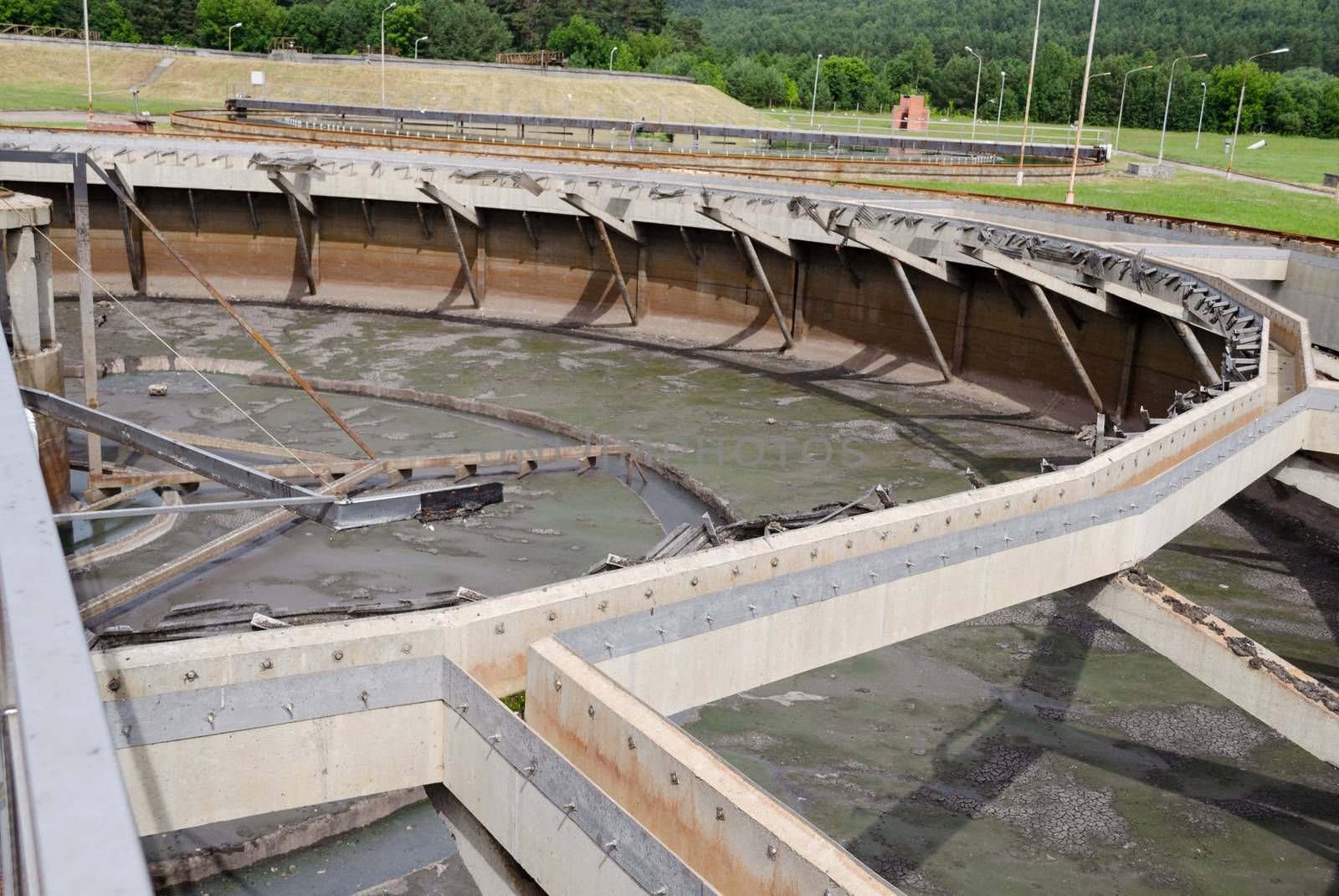 Part of empty old water treatment plant pool under reconstruction.