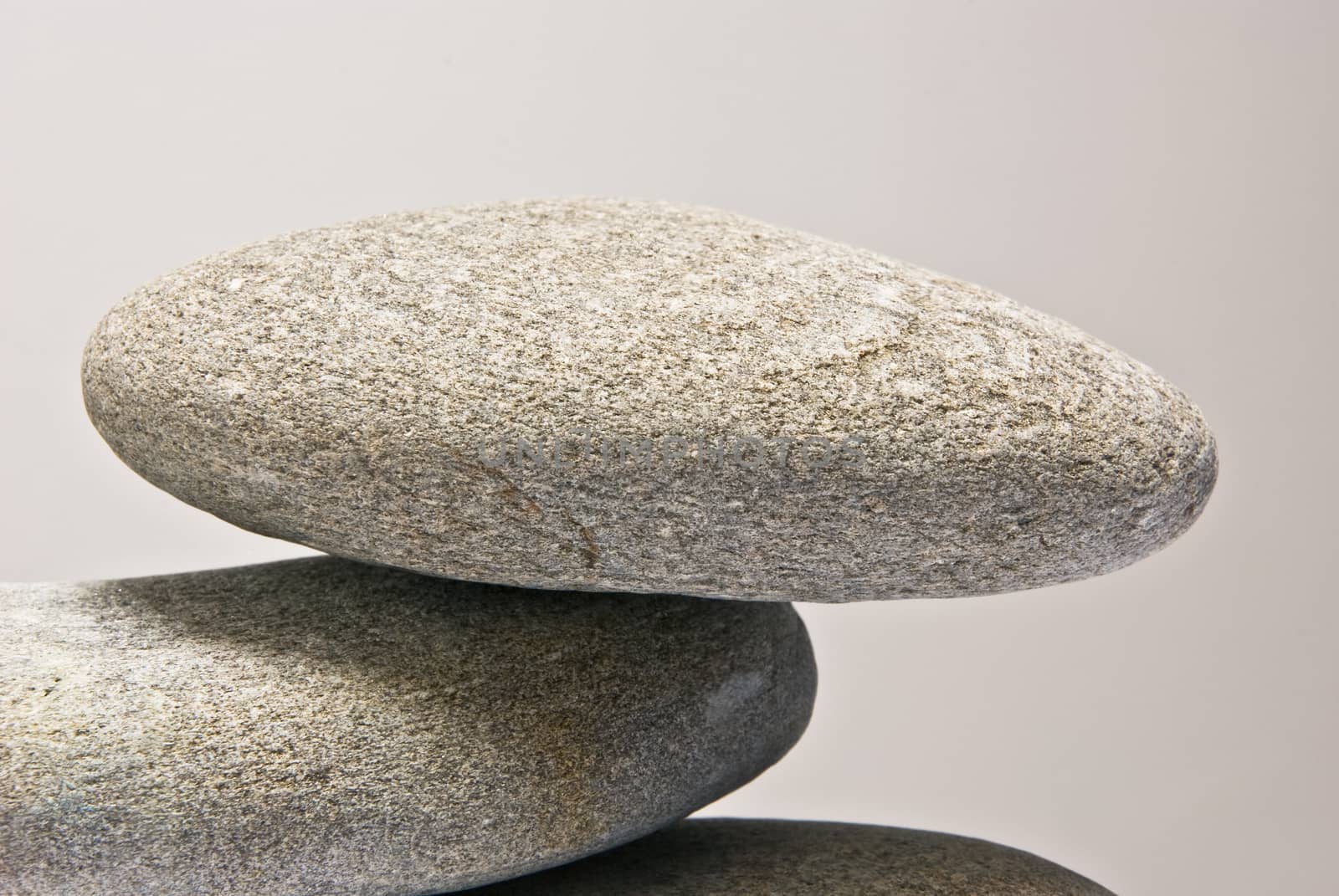 zen pebbles isolated closeup background 