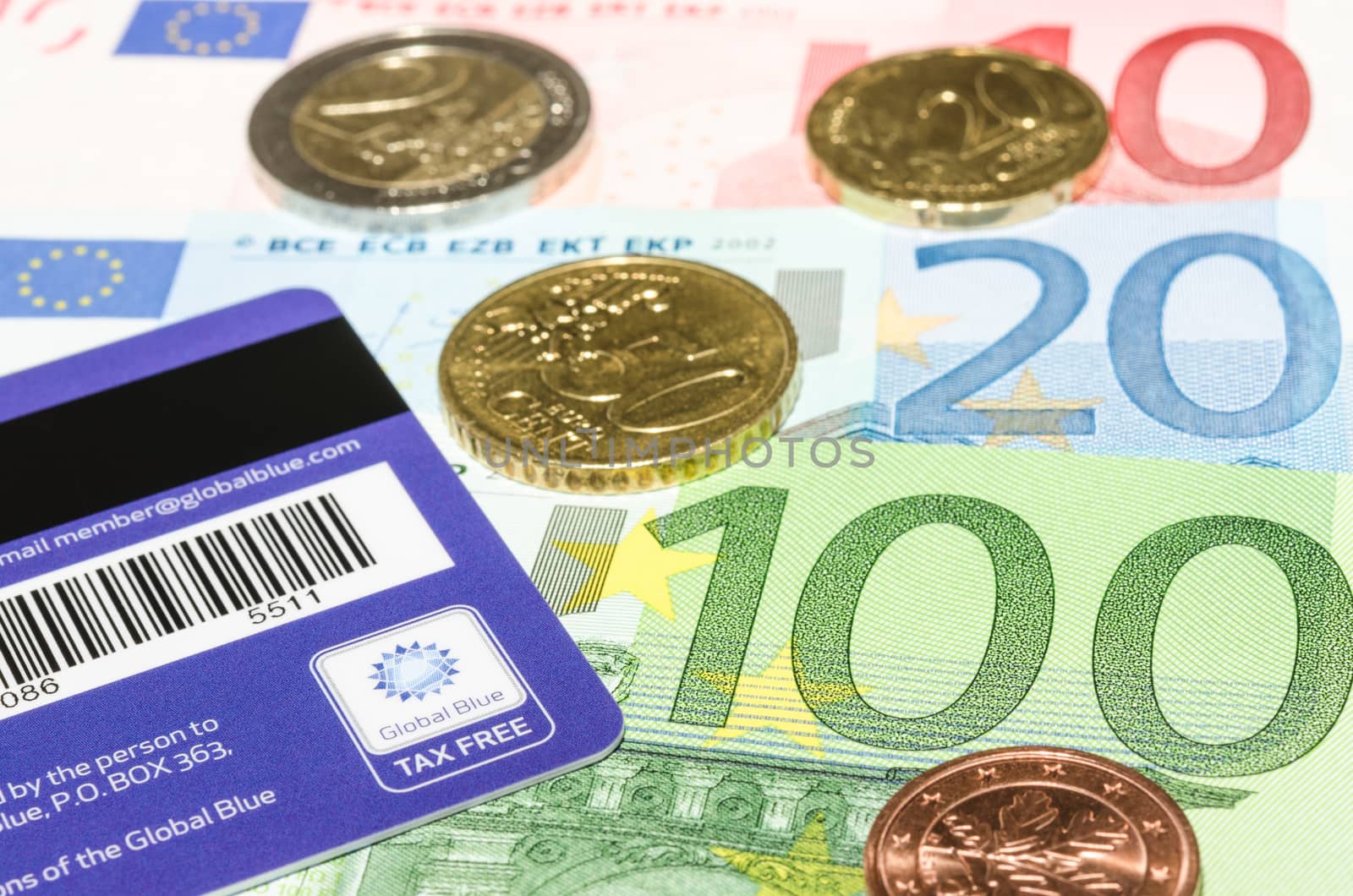 MUNICH, GERMANY - FEBRUARY 24, 2014: Barcode and logo on Global Blue card against European currency.