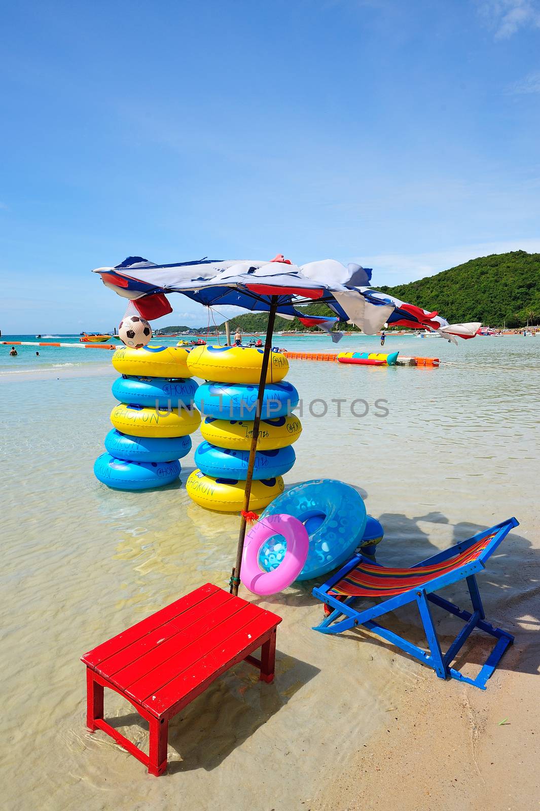 deck chairs on the beach at koh lan ,pattaya, thailand by think4photop