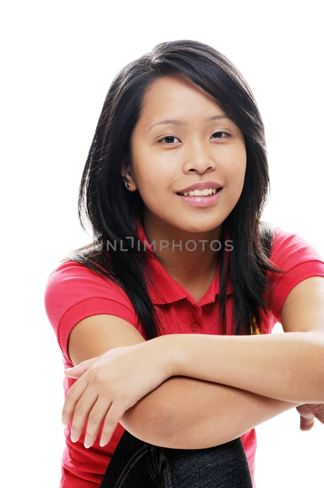 Asian girl wearing red looking happy
