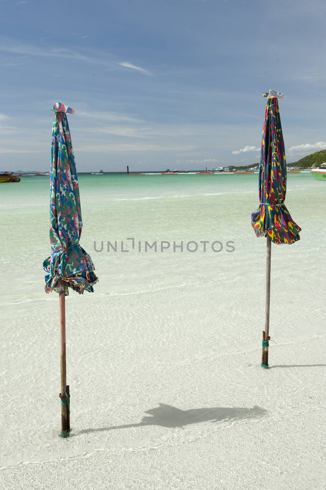 Beach chair and umbrella on the beach , Koh larn , Thailand by think4photop