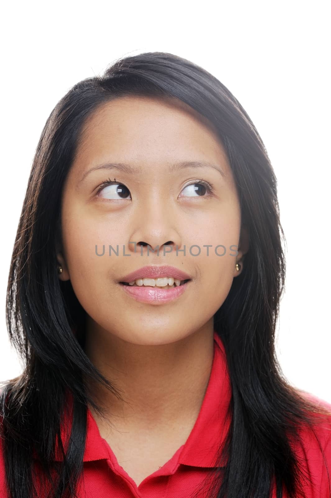 Asian girl in red looking away and smiling