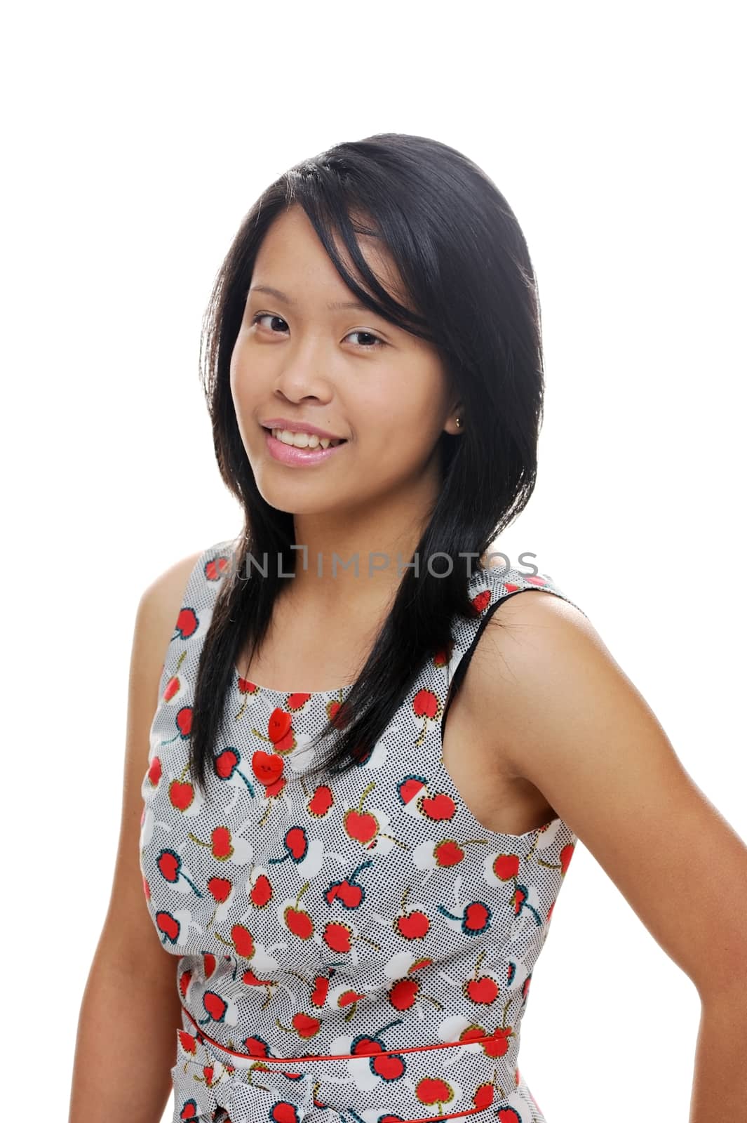 Asian girl looks happy in cherry dress