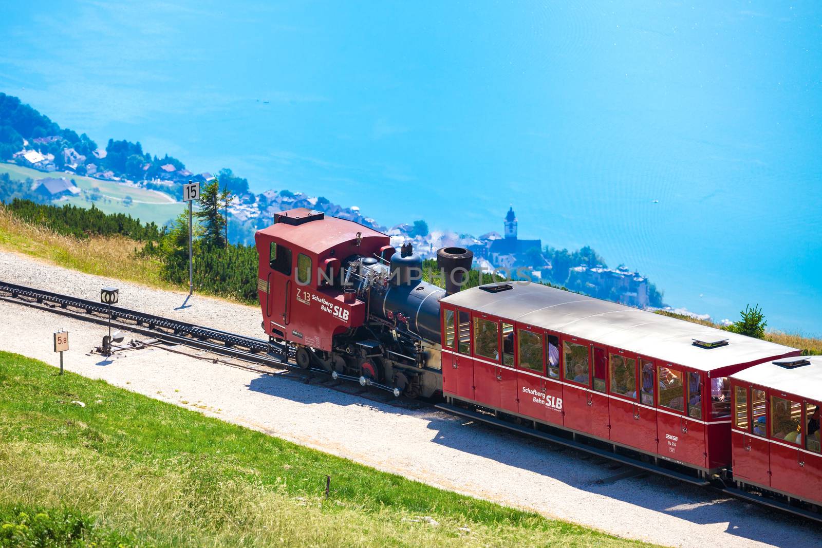 ST. WOLFGANG, AUSTRIA - AUGUST 6: Steam train railway going to Schafberg Peak (1783m) on August 6, 2013 in St. Wolfgang.