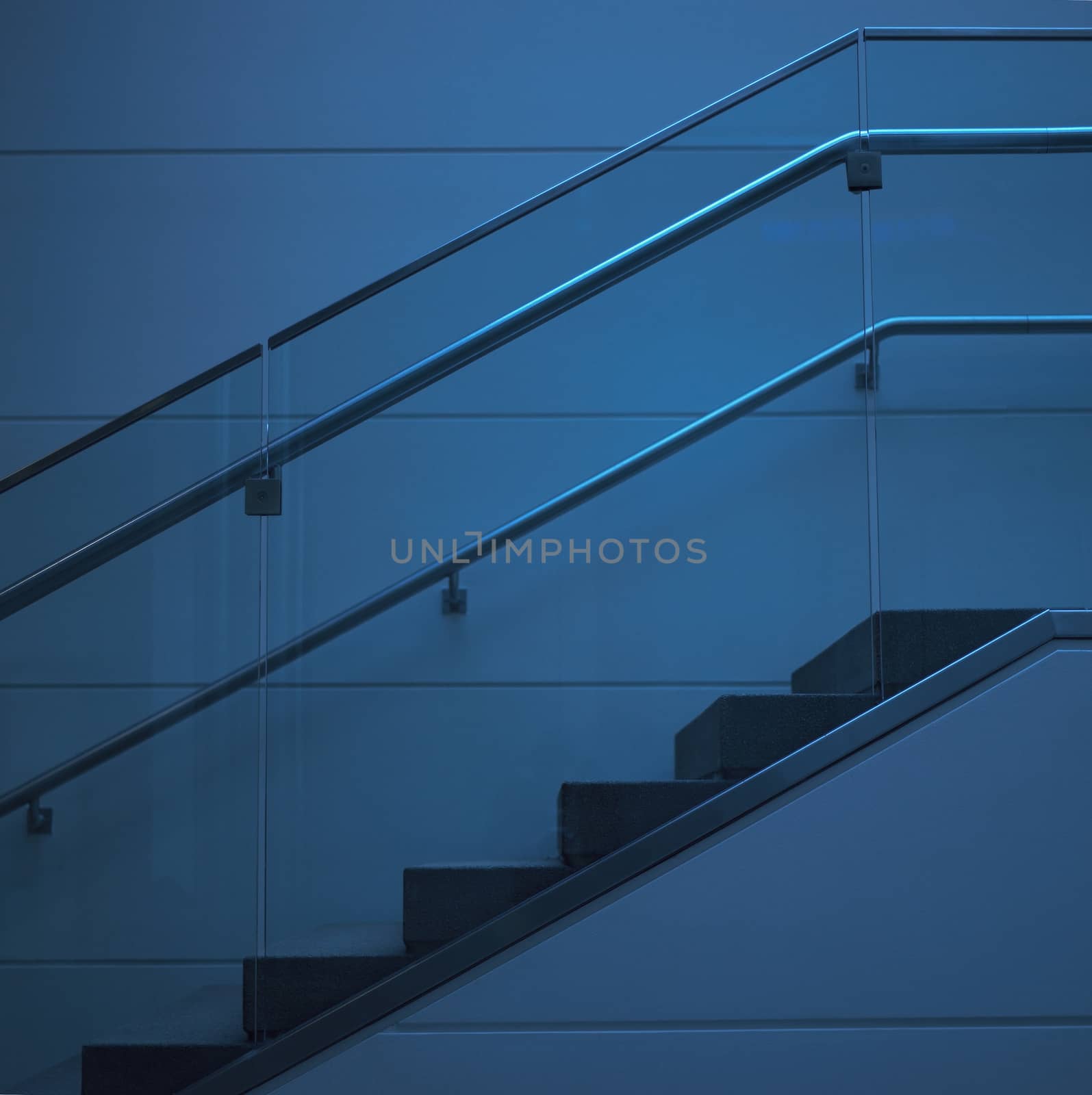 Modern staircase with glass railling