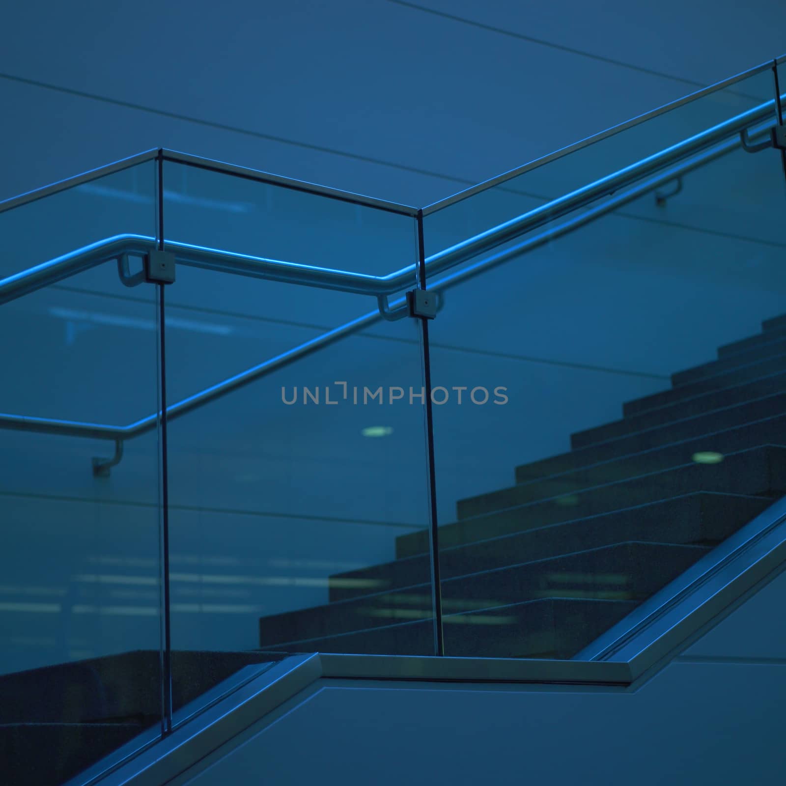 Modern staircase with glass railling 