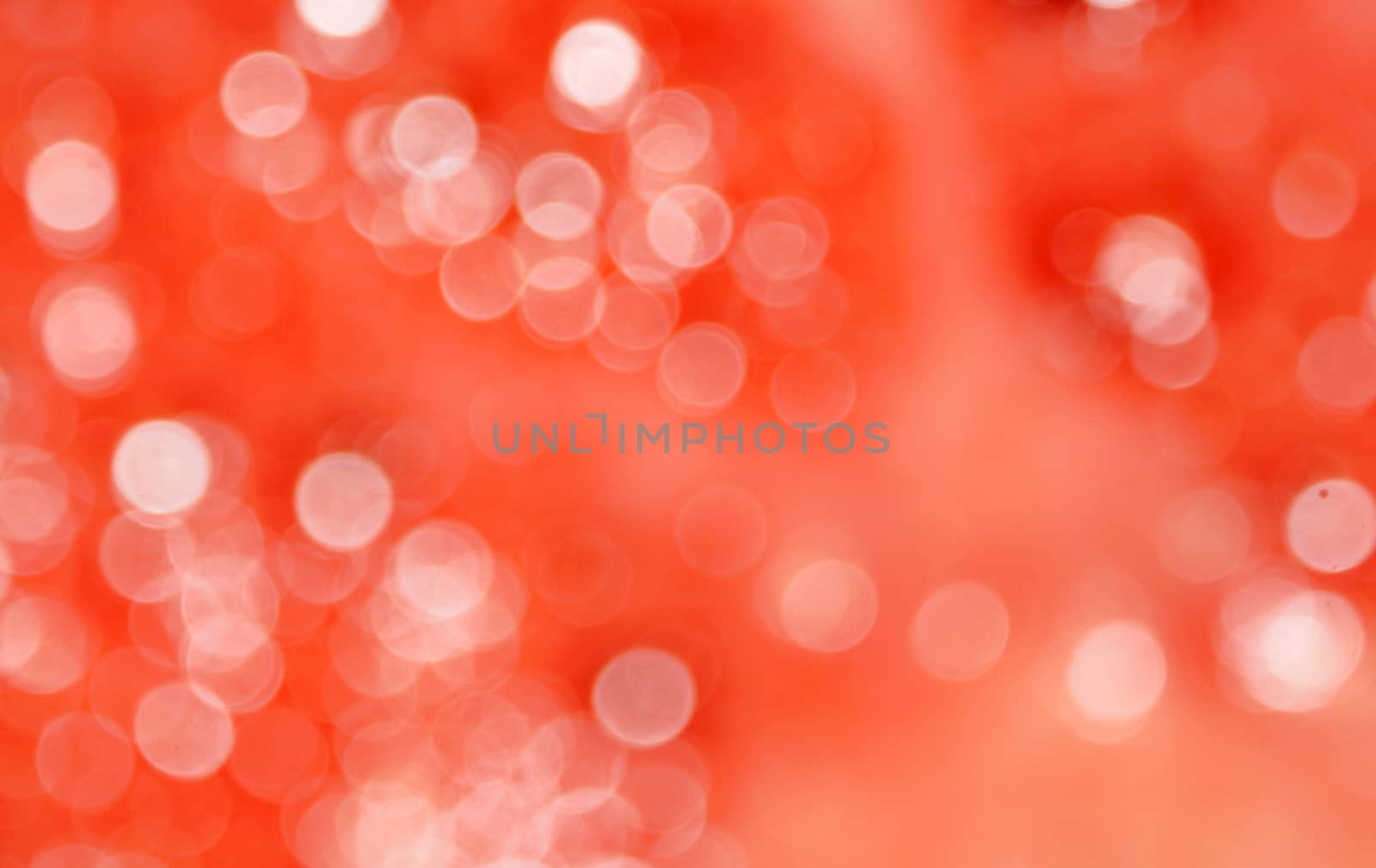 Abstract background of pink color with white spots blurred bokeh                               