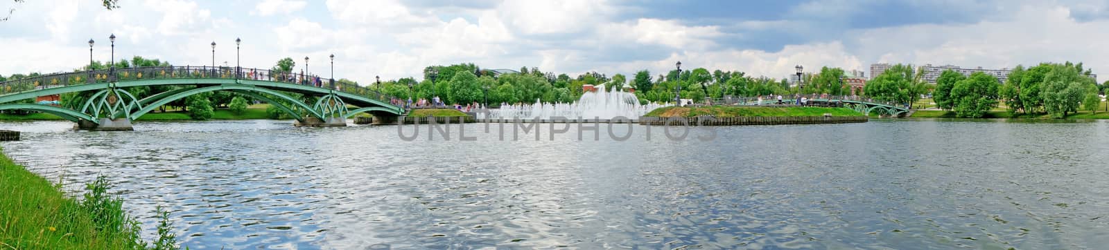 Summer Panorama: bridge over the river and fountain