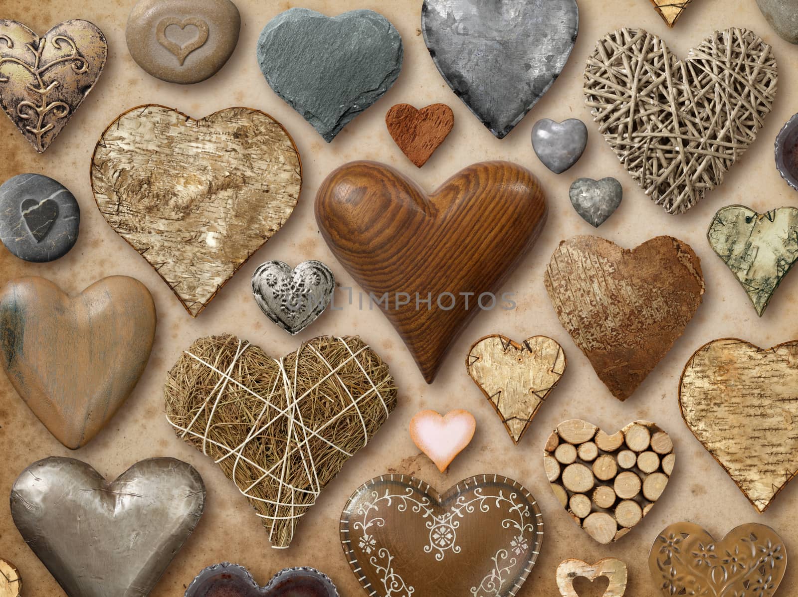 Background of heart-shaped things made of stone, metal and wood.

