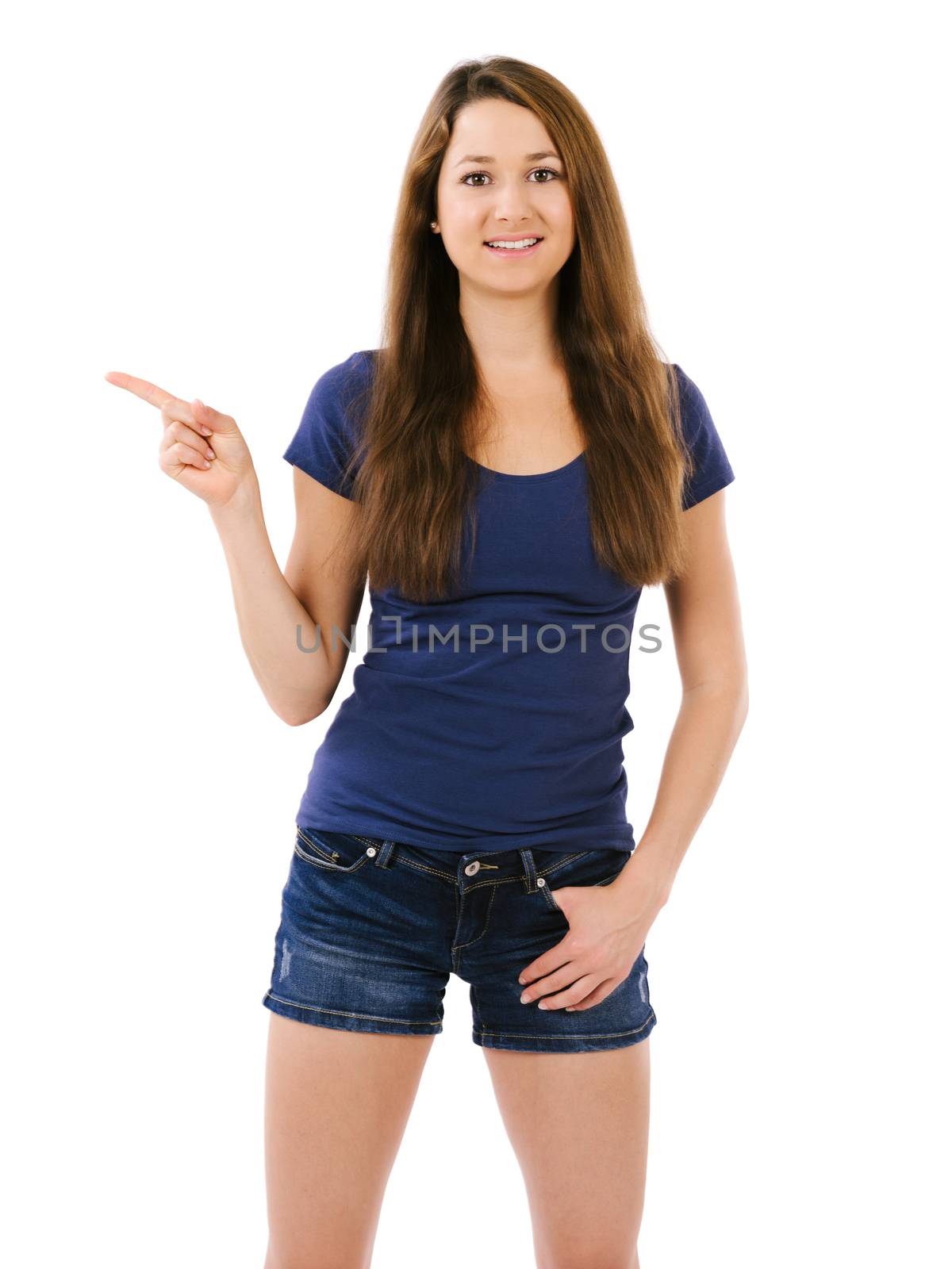 Photo of a happy young female pointing to something with her right hand over white background.