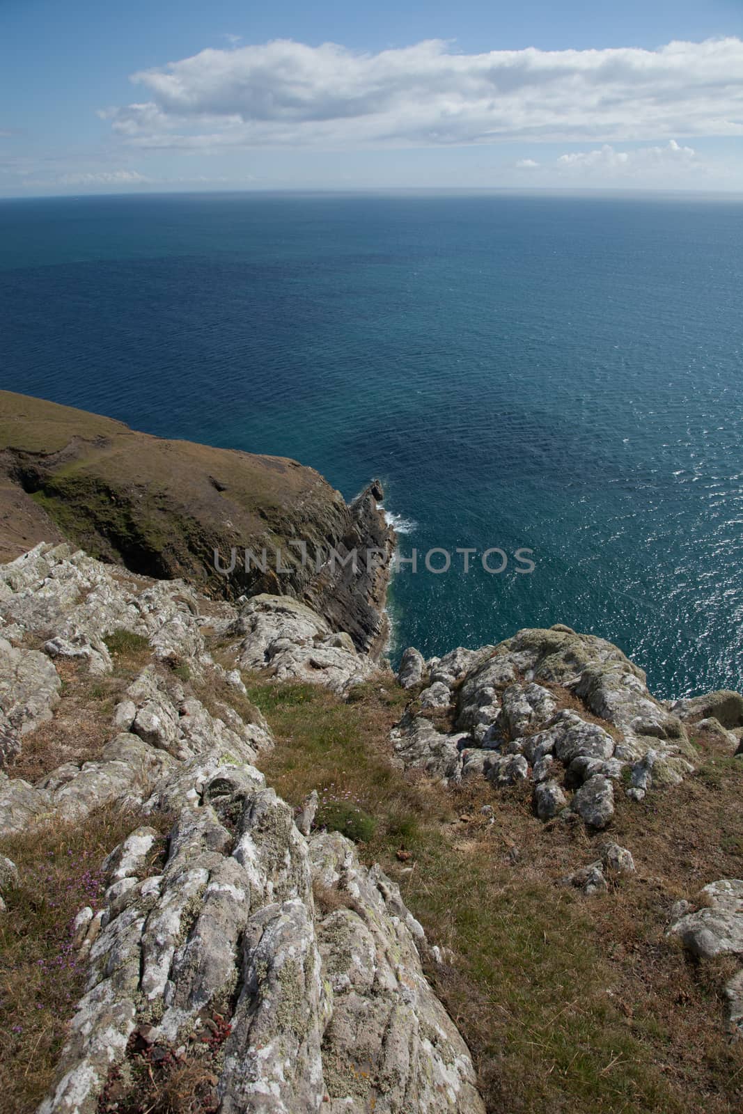 A cliff top view of Fisherman's point, coast path, Cilan Head, Lleyn peninsular, Gwynedd, Wales, UK.