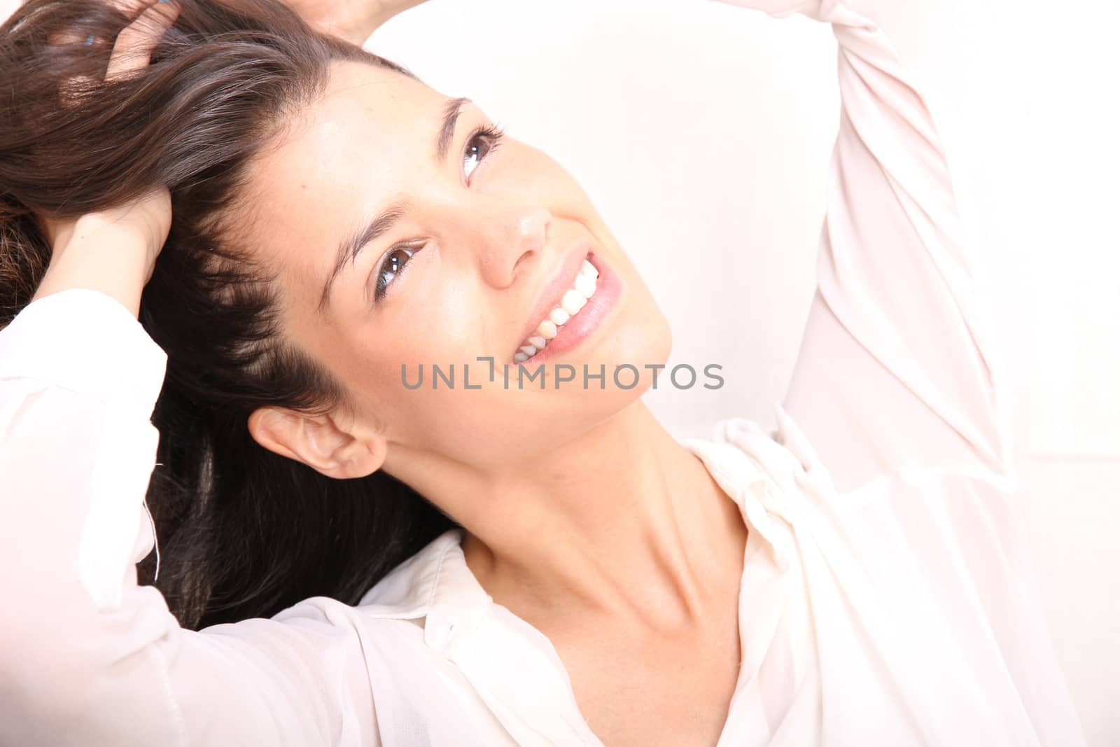 Portrait of a beautiful, laughing, hispanic Woman.