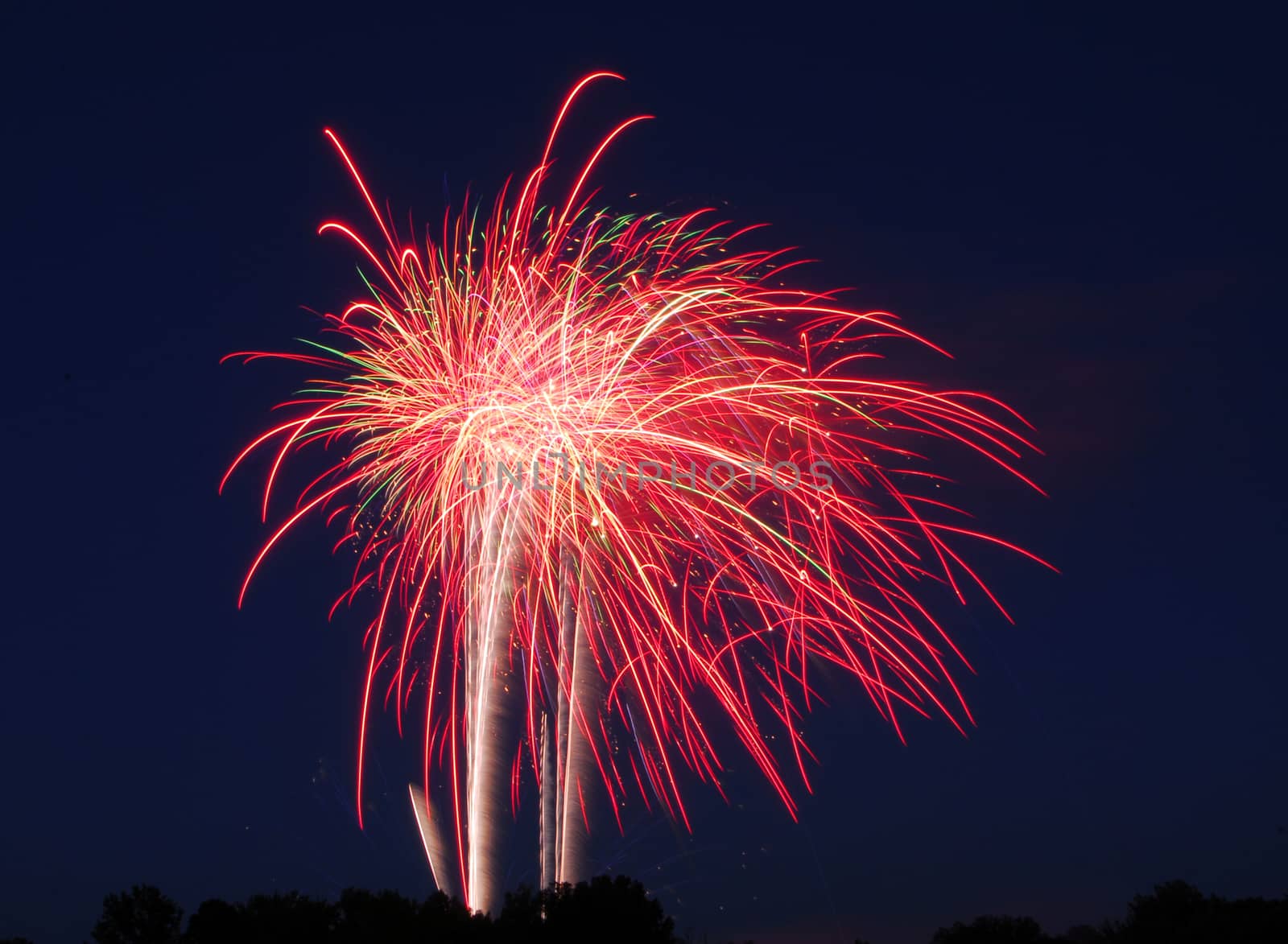 fireworks lighting the night sky in different colors