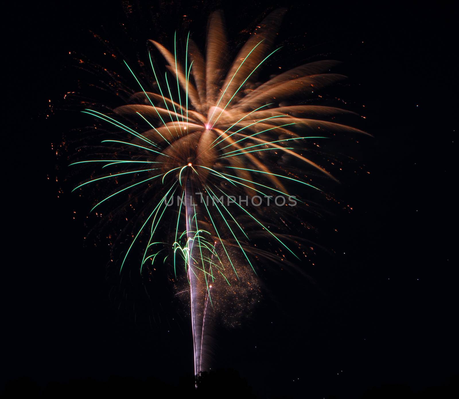 fireworks lighting the night sky in different colors