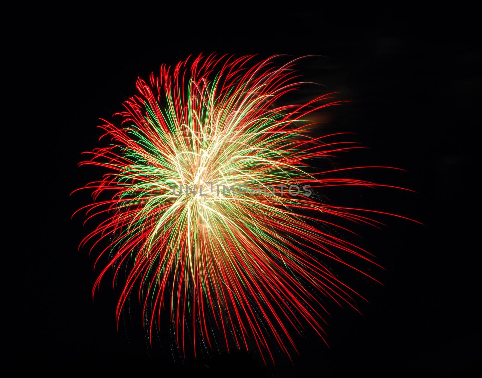 fireworks lighting the night sky in different colors