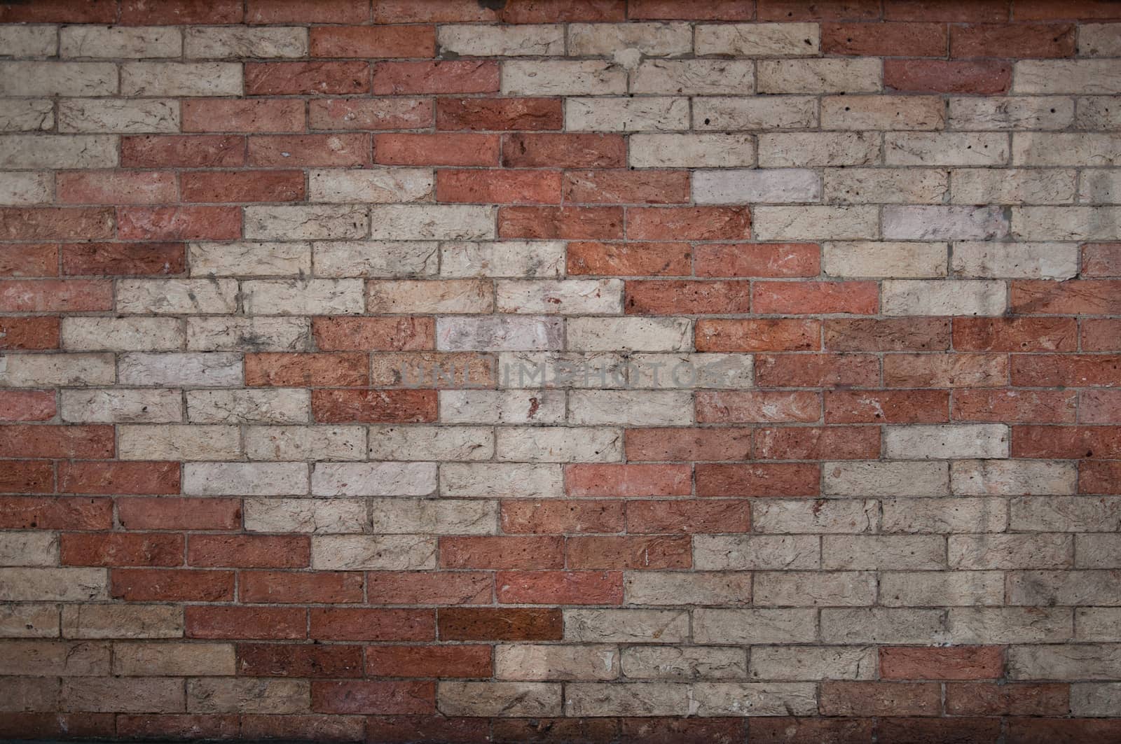 Brick background by NeydtStock