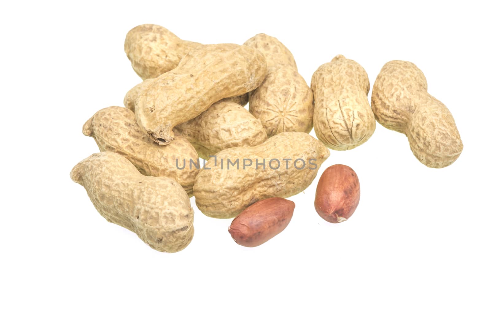 Fresh peanuts isolated on a white background